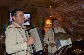 Роман Минай